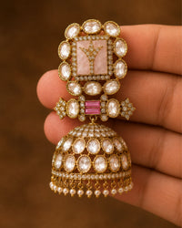 Gold Kundan Jhumka Earrings with Pink Accents